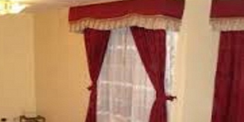 TAPICERÍA Y CORTINAS SERRANO